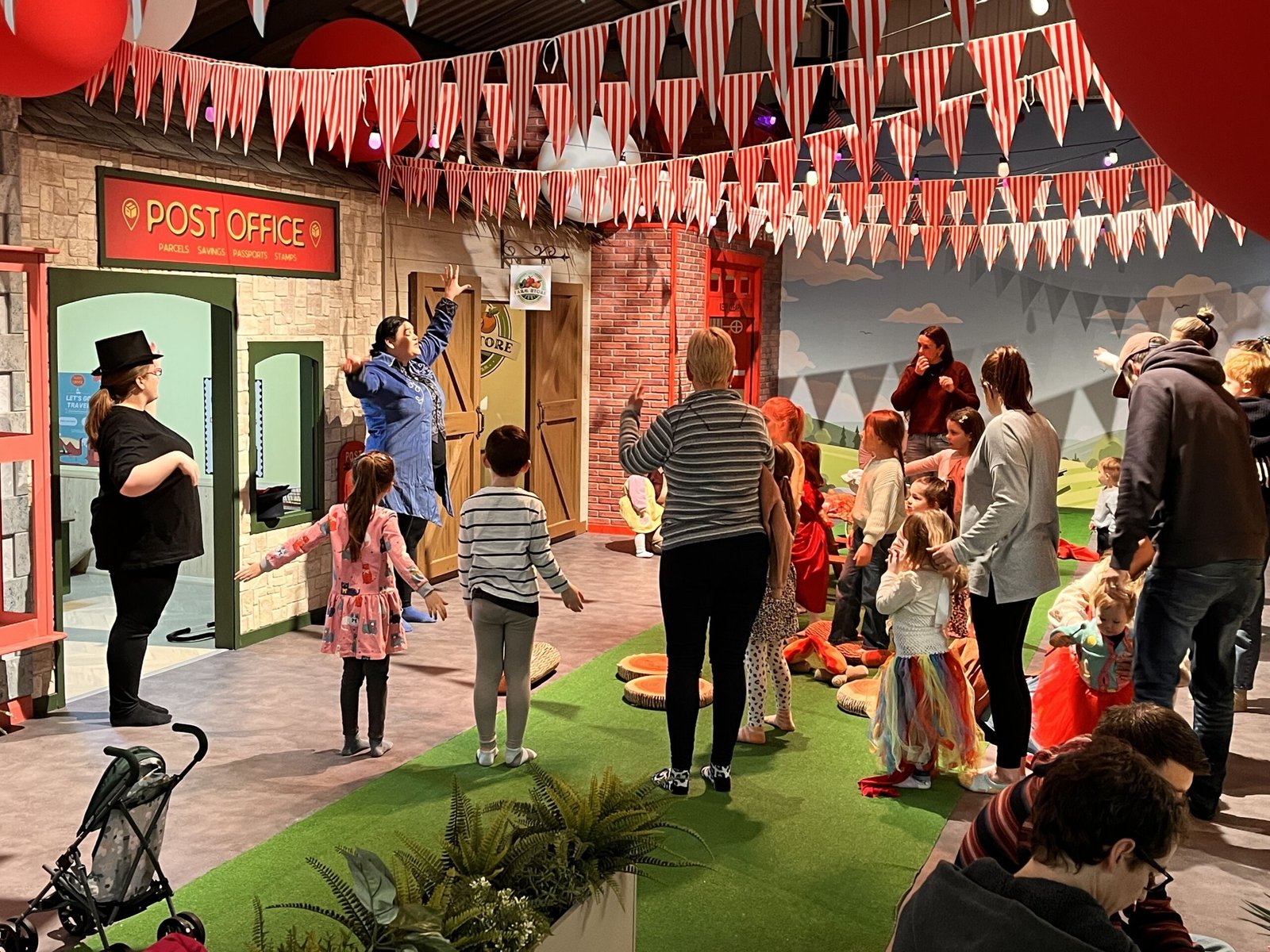 Live performers entertain primary children in our after school play sessions at Discovery Village