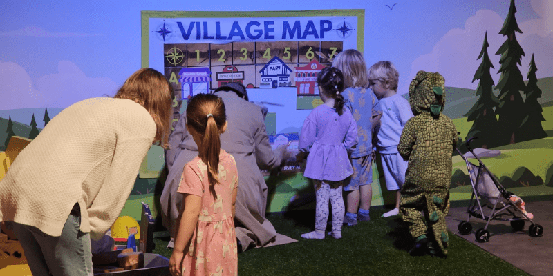 children learn to be Trainee detectives in a treasure hunt type activity at Discovery Village