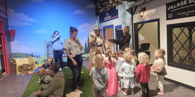 Children guided by live actors using their imaginations