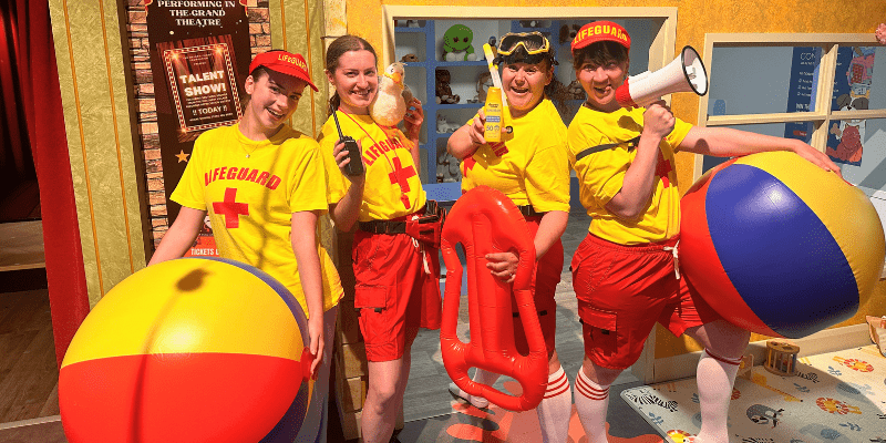 Children taking part in Sunny Shore's Beach Ball Bash role play adventure, learning beach safety through interactive games and activities near Bournemouth Beach.
