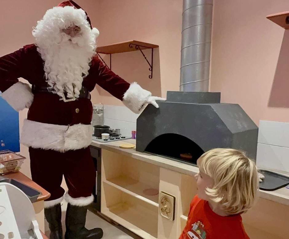 Children show santa around Discovery Village in Dorset